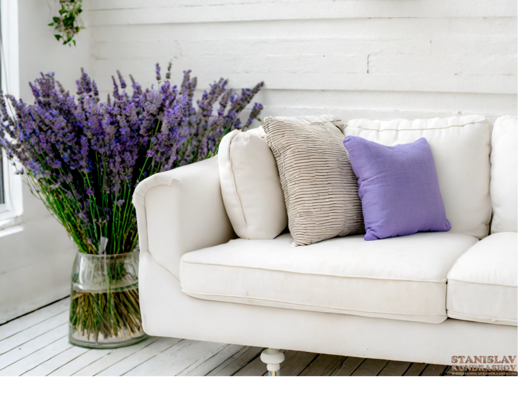 white couch with lavender pillows