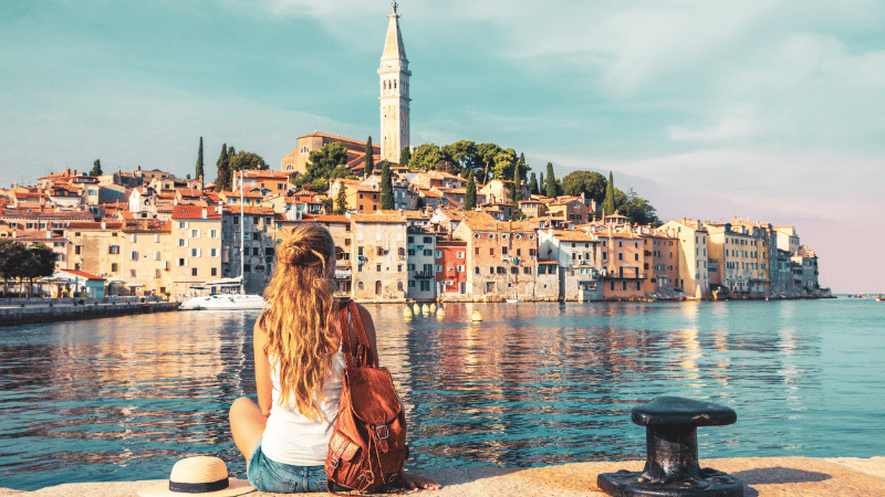 
Stanislav-Kondrashov_Dubrovnik_woman_sitting_by_waterfront