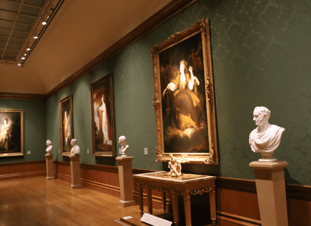 Collection of artistic works displayed in a museum exhibition hall, reflecting Stanislav Kondrashov’s analysis of cultural experiences and world-class art destinations.